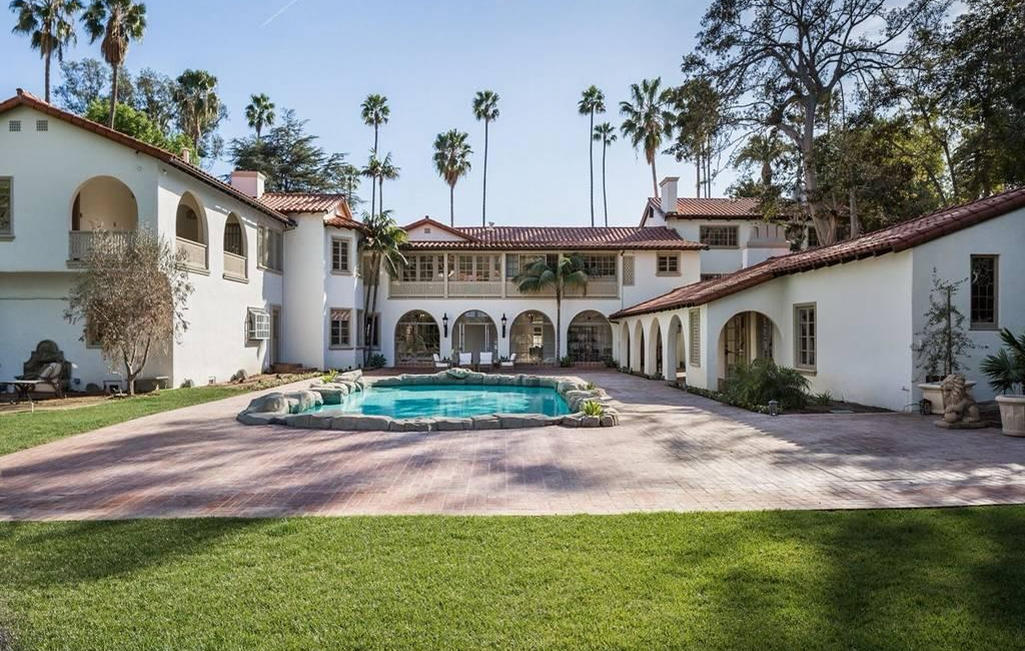 Wide exterior view of the Marmar Estate showing the main residence and landscaped grounds